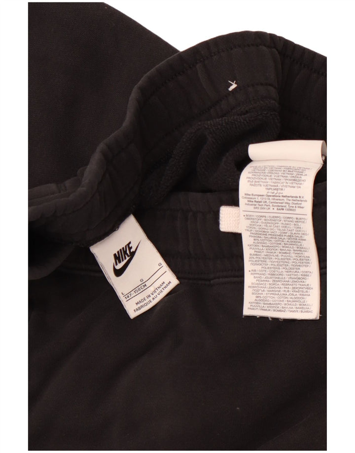 NIKE Pantalones de chándal con estampado gráfico para niños, 12-13 años, grande, negro