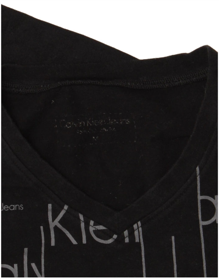 Calvin Klein Jeans Mujer Gráfico Top Manga Larga UK 12 Mediano Negro