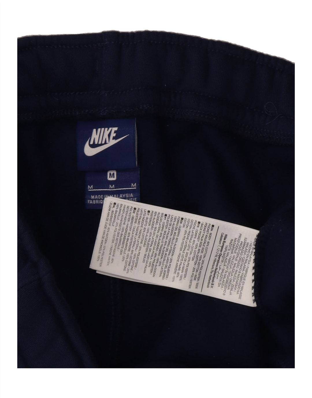 NIKE Mens Graphic Tracksuit Trousers Joggers Medium  Navy Blue Cotton Vintage Nike and Second-Hand Nike from Messina Hembry 