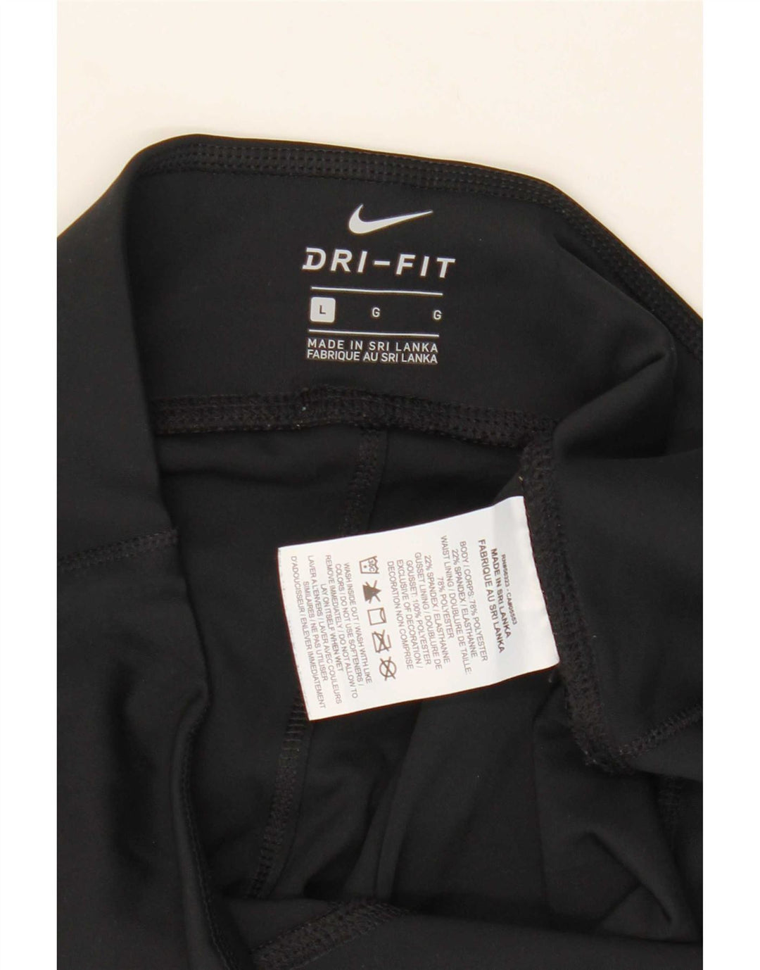 Nike - Leggings capri Dri Fit para mujer, talla 40, poliéster negro grande