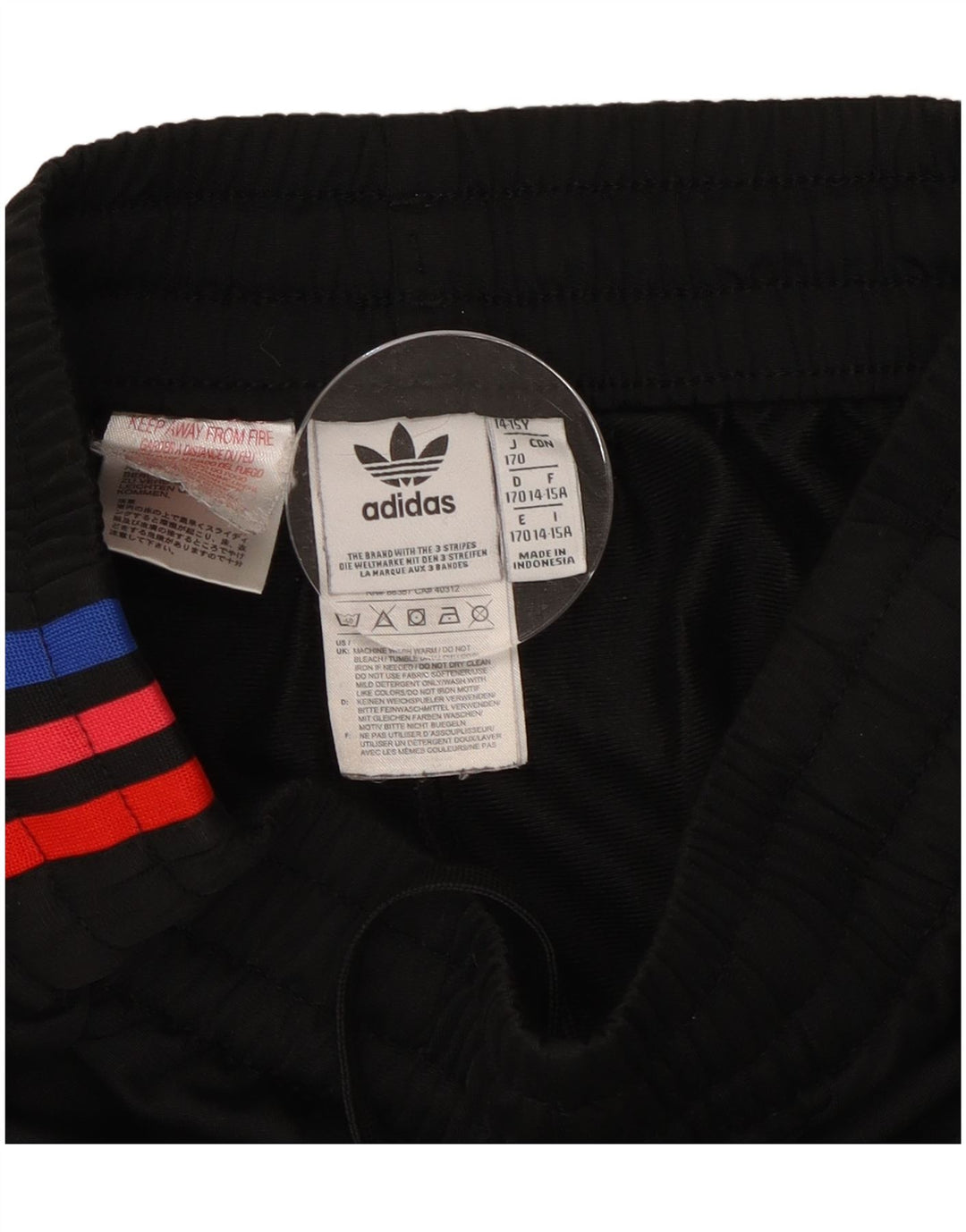 Adidas Pantalones de chándal con estampado gráfico para niño 14-15 años Negro Poliéster