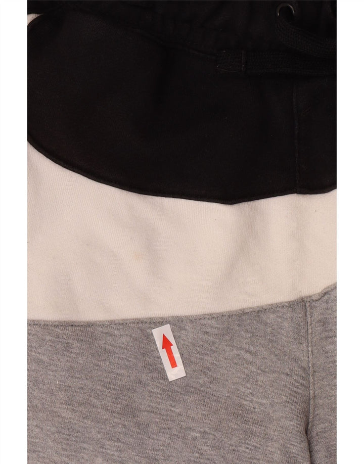 Pantalones cortos deportivos Nike de algodón color block en gris medio para hombre
