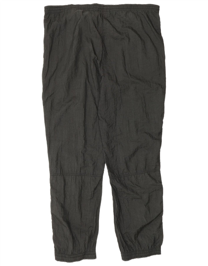 Reebok - Pantalones de chándal para hombre, talla grande, nailon negro