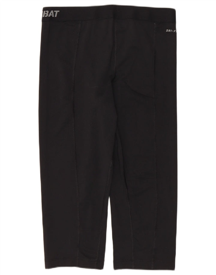 Nike - Leggings capri Dri Fit para mujer, talla M, color negro