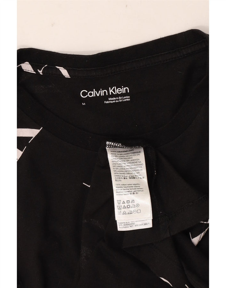 Calvin Klein Camiseta gráfica para hombre Top mediano de algodón negro