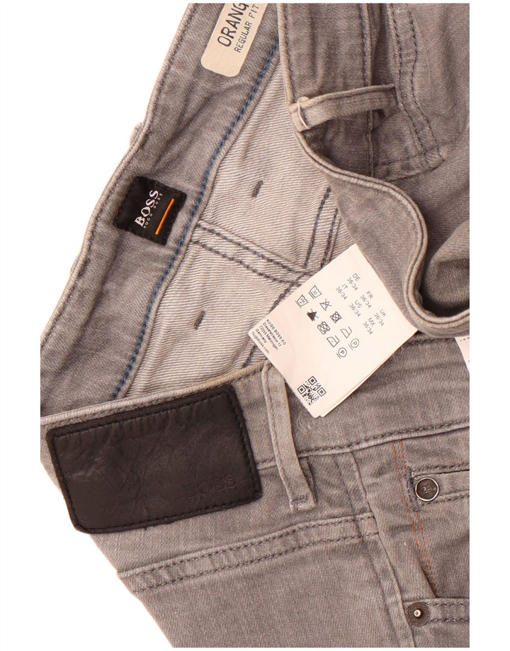 Hugo Boss Vaqueros rectos de corte regular para hombre W36 L34 Algodón gris