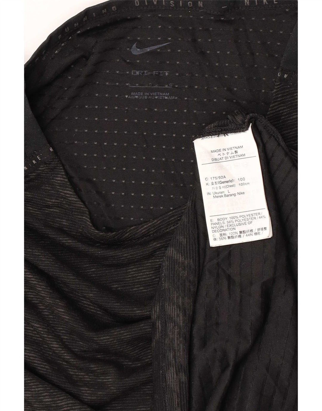 Nike Dri Fit - Camiseta con estampado abstracto para mujer, talla 40, color negro
