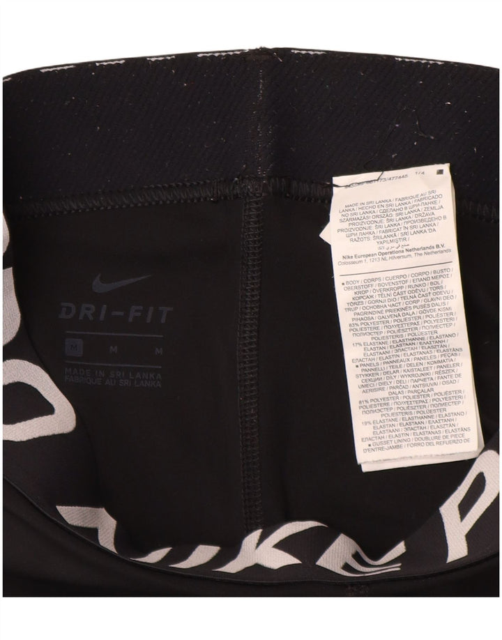 Nike - Leggings capri gráficos para mujer, talla 40, poliéster negro mediano