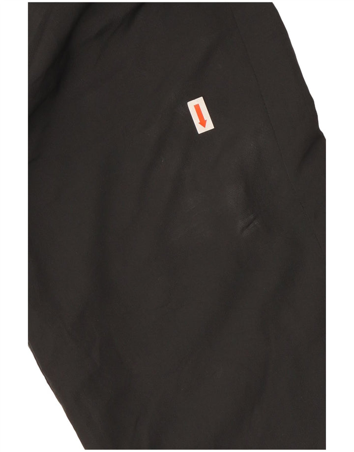 Nike Pantalones de chándal con gráfico para niños 10-11 años Mediano Negro Poliéster