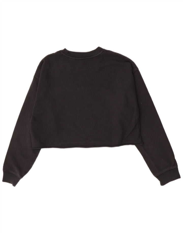 Levi's Sudadera de gran tamaño con gráfico para mujer, talla 10, algodón negro pequeño