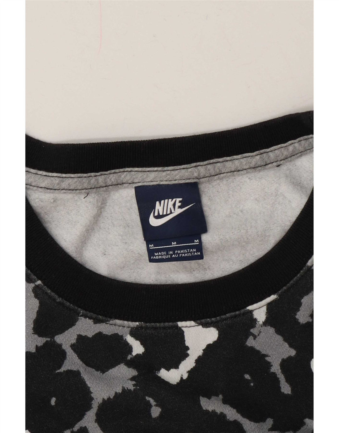 Nike - Sudadera para mujer, talla 40, talla mediana, color negro, estampado animal