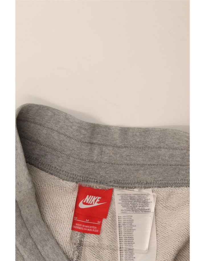 Pantalones cortos deportivos con gráficos para hombre Nike de algodón gris medio