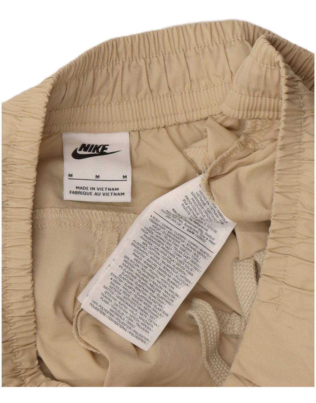 Pantalones cortos tipo cargo Nike para hombre mediano W34 algodón beige