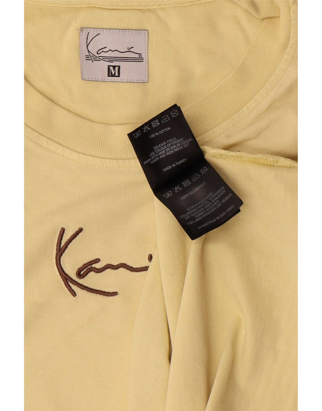 Karl Kani Camiseta gráfica para hombre Top Algodón amarillo medio