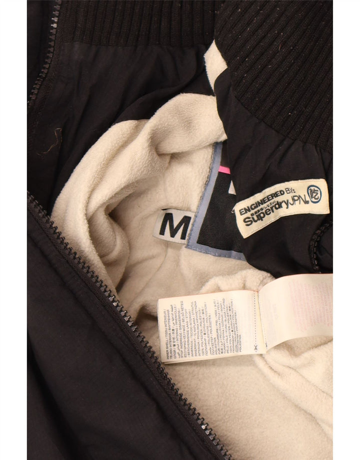 Superdry Chaqueta Cortavientos Con Capucha Gráfica Para Mujer UK 44 Mediano Negro