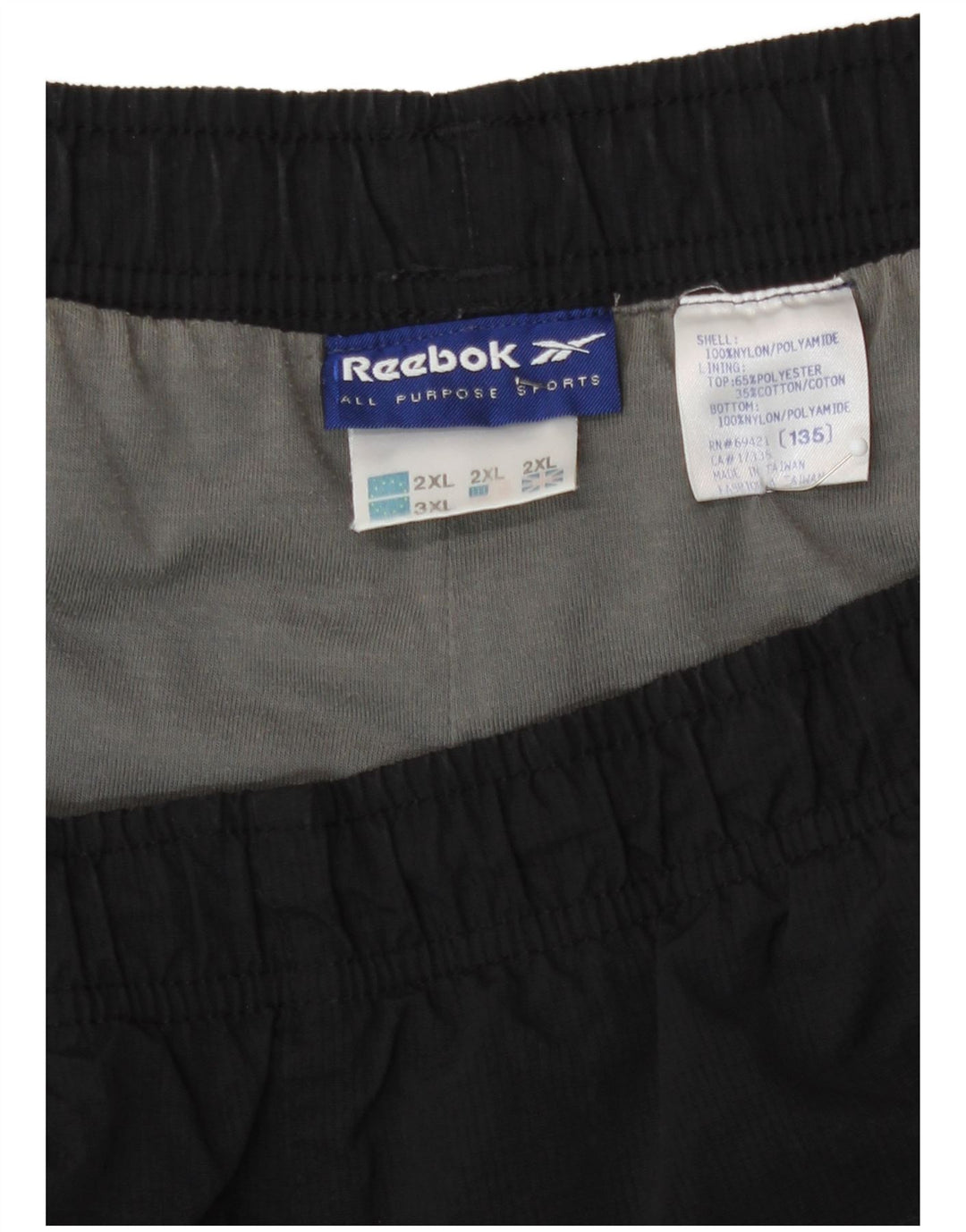 Reebok - Pantalón de chándal para hombre, talla 2XL, nailon negro