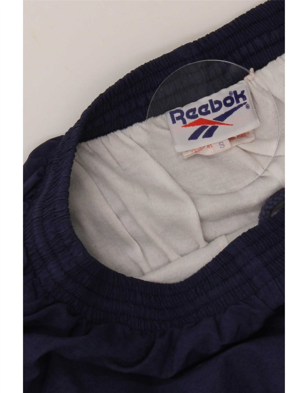 Reebok - Pantalones de chándal para hombre, color azul marino, nailon