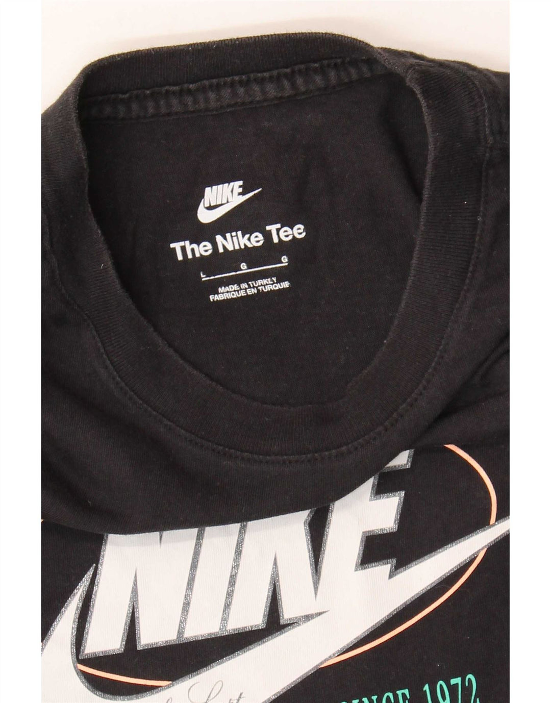 Nike - Camiseta gráfica para mujer, talla 40, color negro