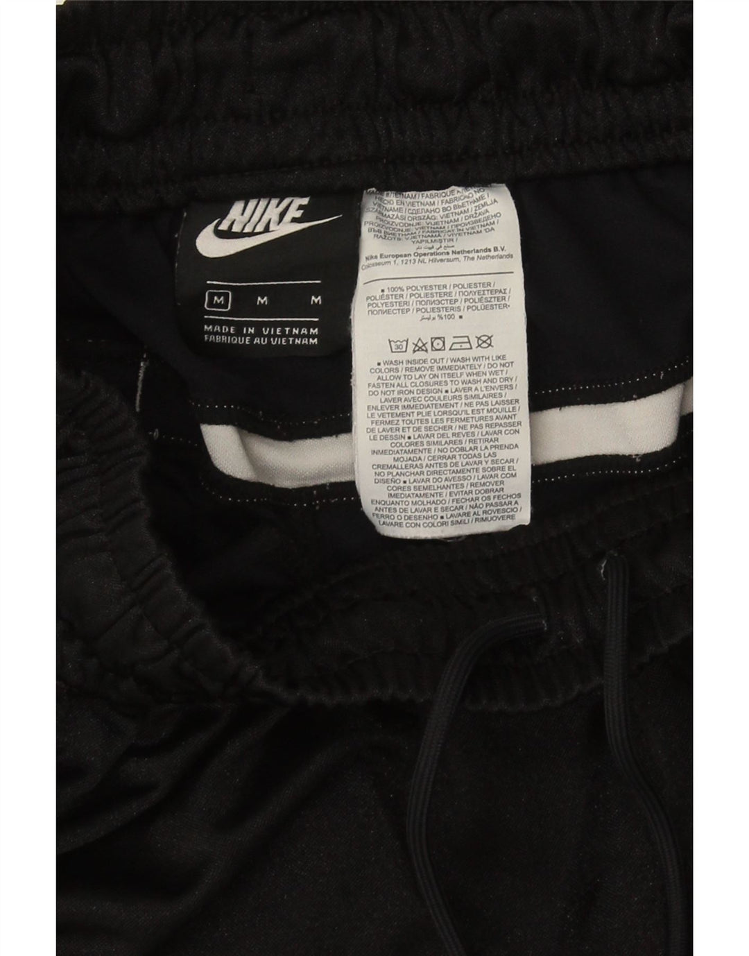 Pantalones cortos deportivos con estampado gráfico de hombre Nike Poliéster color block en negro mediano