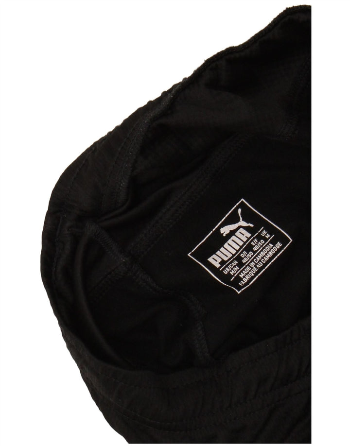 PUMA Pantalones de chándal con estampado gráfico Medium Black para hombre