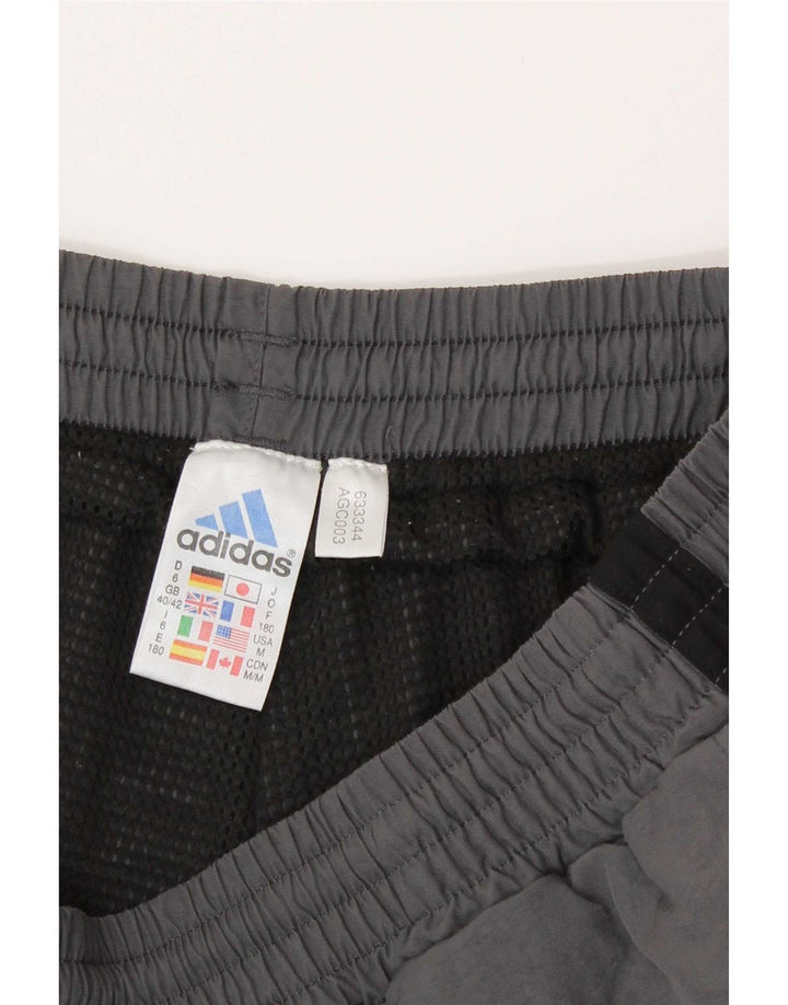 Adidas - Pantalón de chándal para hombre, talla 40/42, color gris medio, poliamida