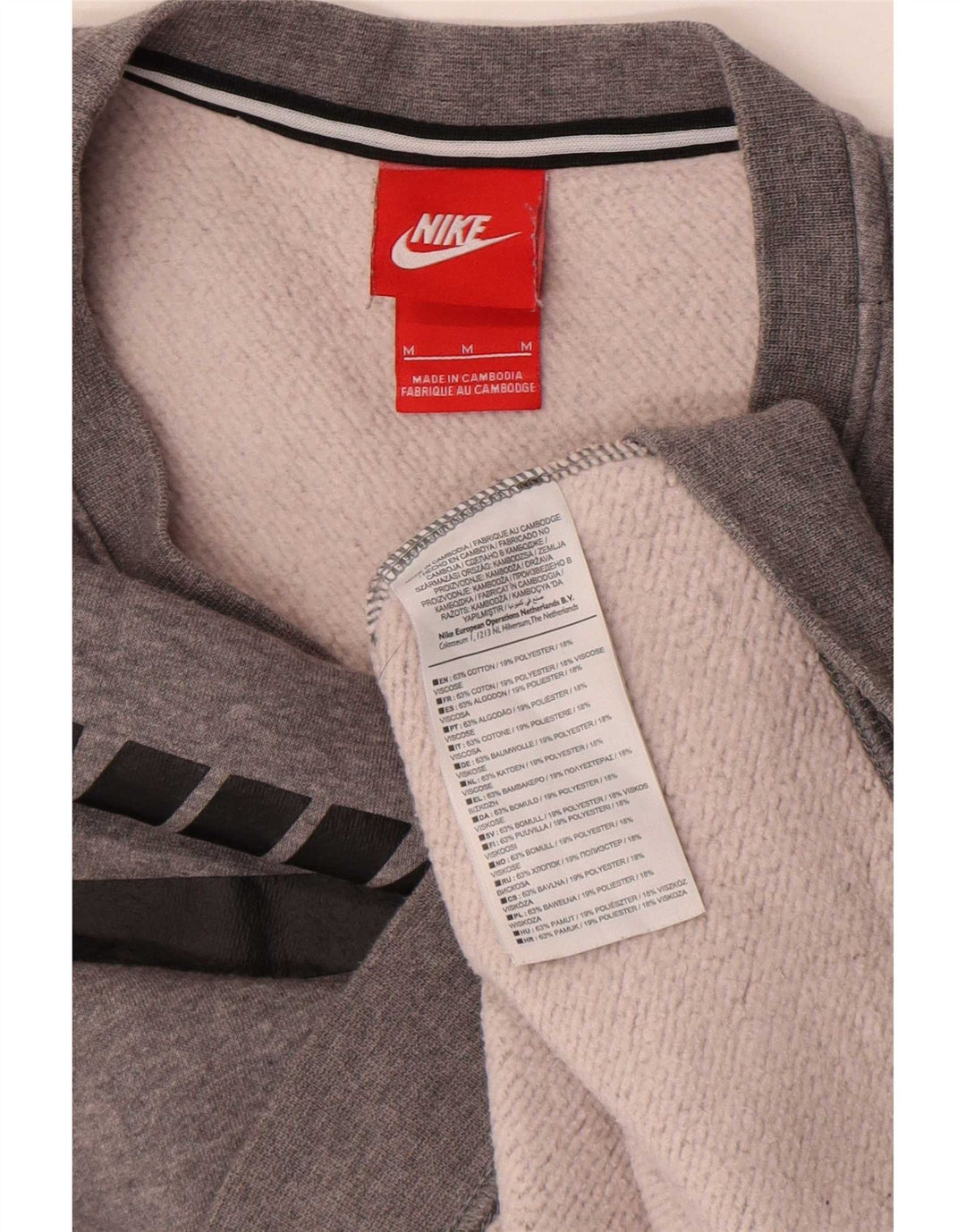 Nike - Sudadera gráfica para mujer, talla 40, algodón moteado gris medio