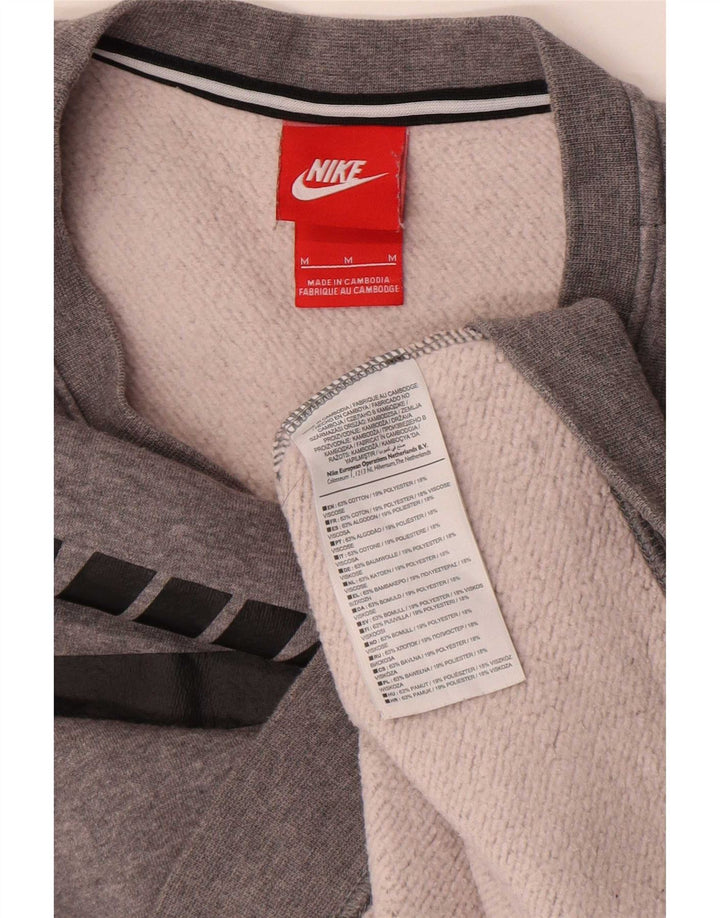 Nike - Sudadera gráfica para mujer, talla 40, algodón moteado gris medio