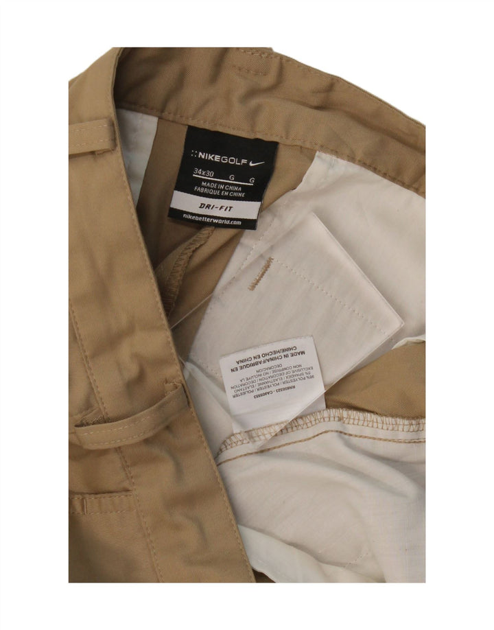 NIKE Pantalón chino recto Dri Fit para hombre W34 L30 Poliéster beige