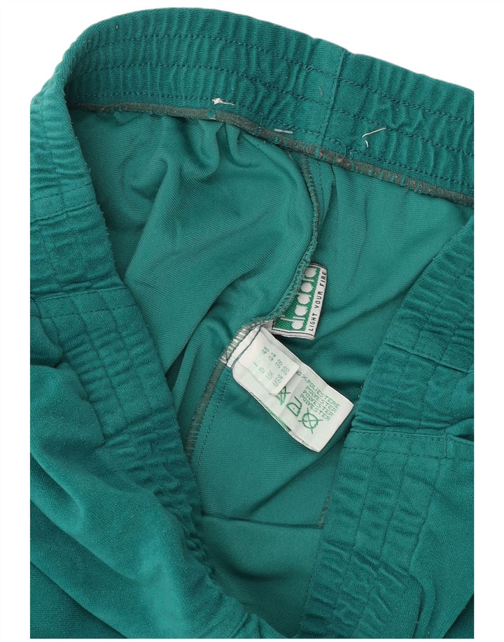 Diadora Pantalones de chándal de terciopelo para hombre ES 38 Verde medio Poliéster