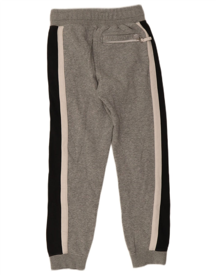 Nike - Pantalones de chándal para niño, 10-11 años, color gris medio