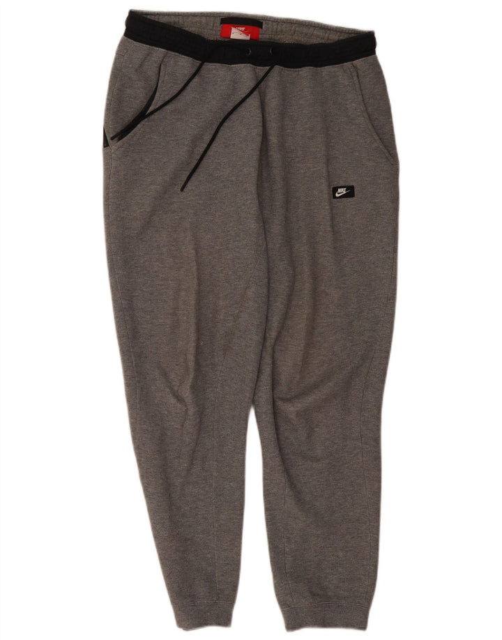 NIKE Hombre Pantalones de Chándal Joggers Gris Medio Algodón