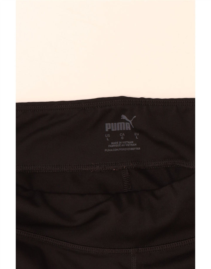 PUMA Leggings cortos con estampado gráfico para mujer, talla 40, talla grande, color negro