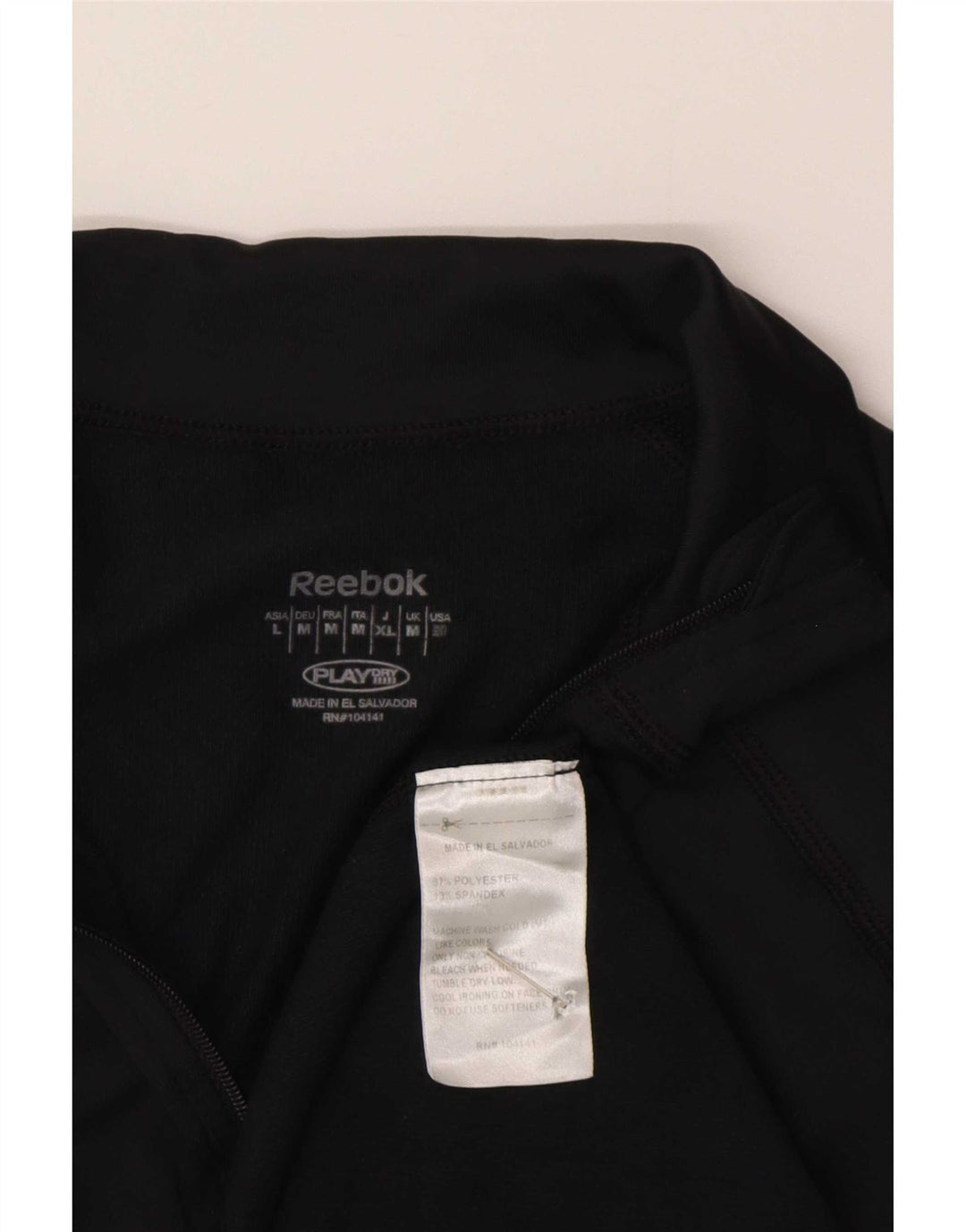 Reebok - Chándal con cremallera y cuello para mujer, talla M, poliéster negro