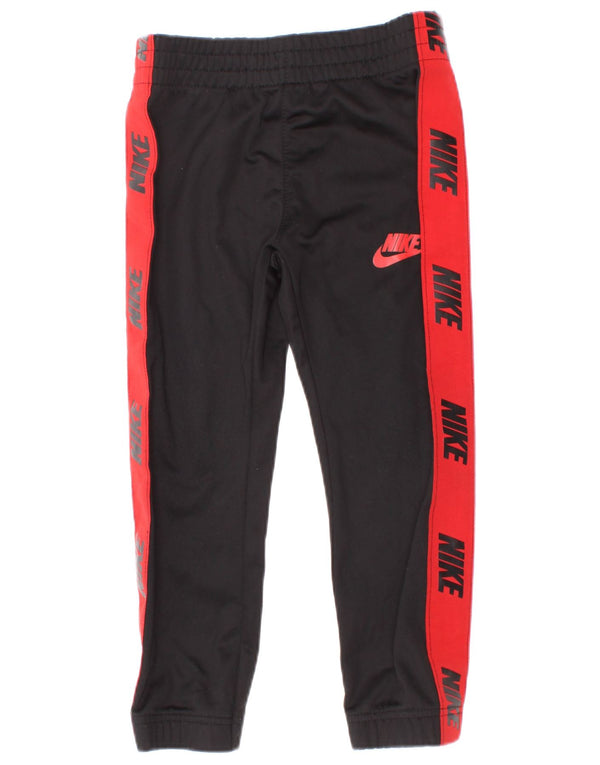 Nike - Pantalones de chándal con estampado gráfico para niño, 4-5 años, color negro
