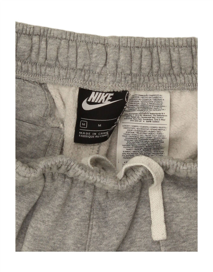 Pantalones cortos deportivos con gráficos para hombre Nike de algodón gris medio