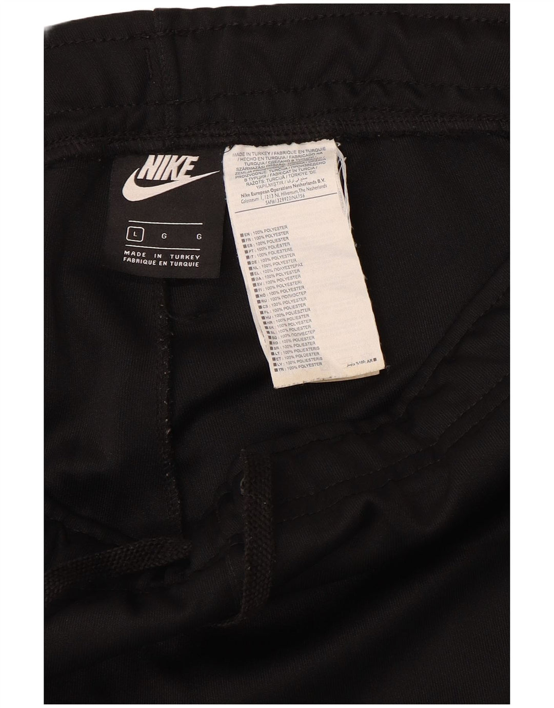 NIKE Hombre Pantalones de chándal con gráfico Joggers Large Poliéster negro