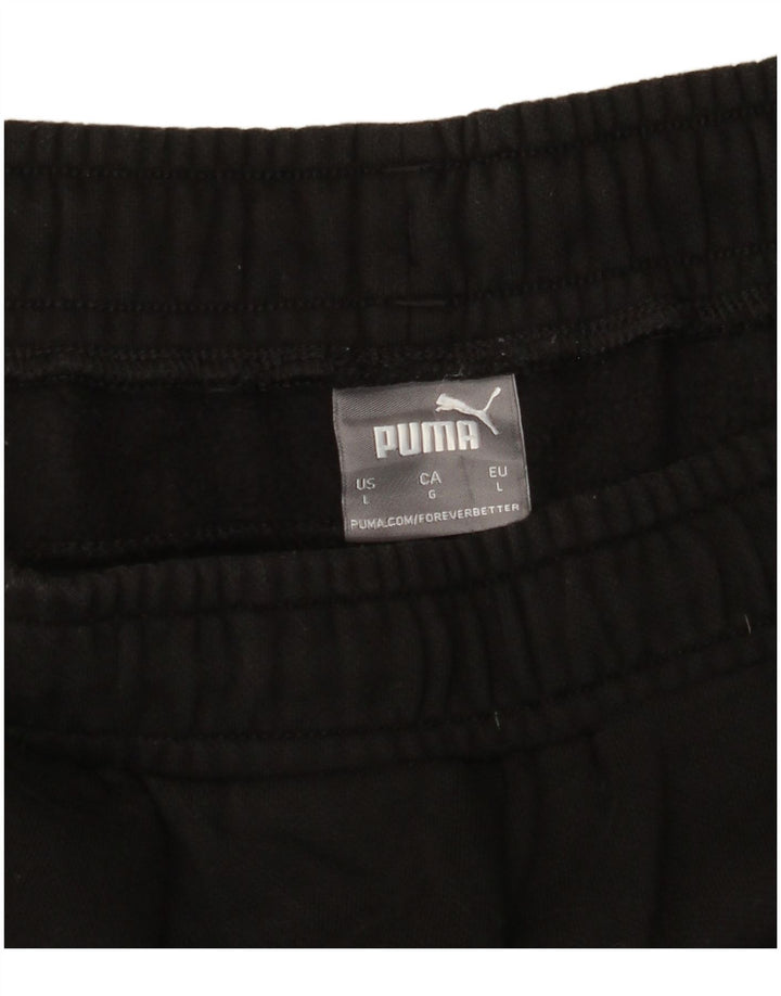PUMA Pantalones de chándal con estampado gráfico para hombre Joggers Large Black