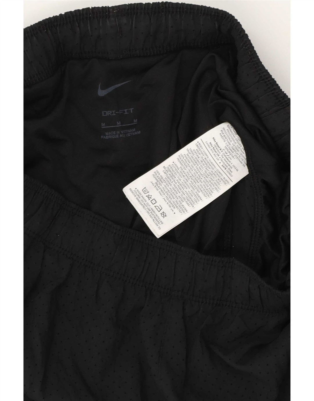 Nike - Pantalones cortos deportivos Dri Fit para mujer, talla M, poliéster negro