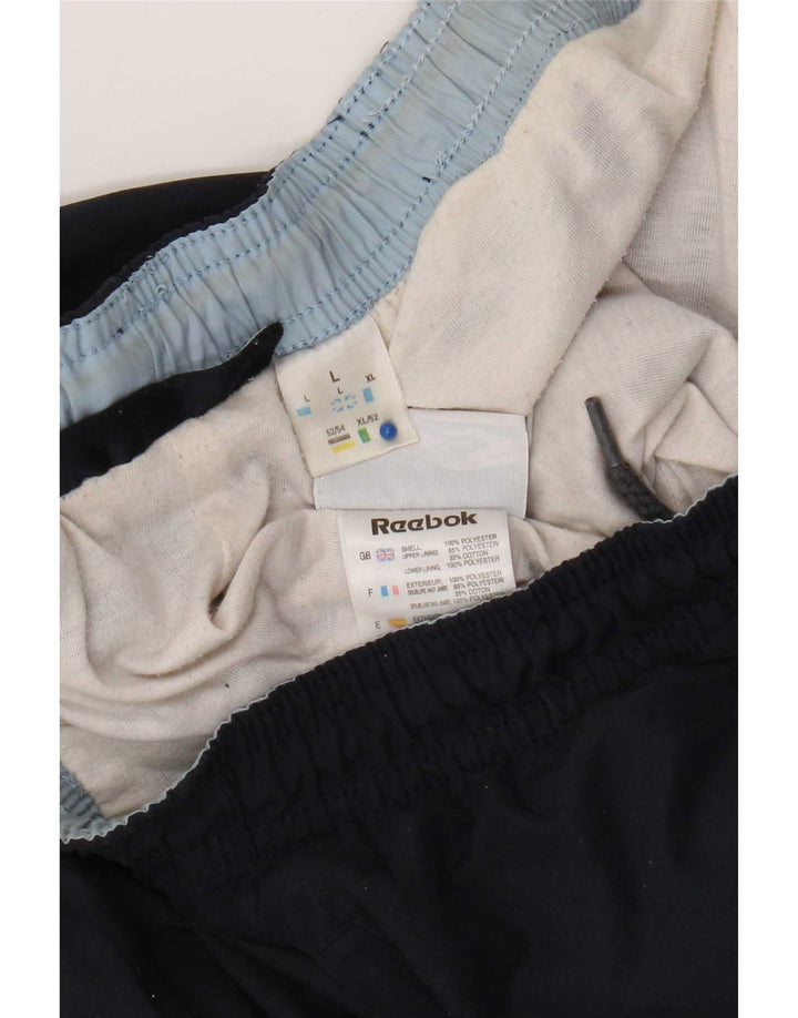 Reebok - Pantalón de chándal para hombre, color azul marino, poliéster