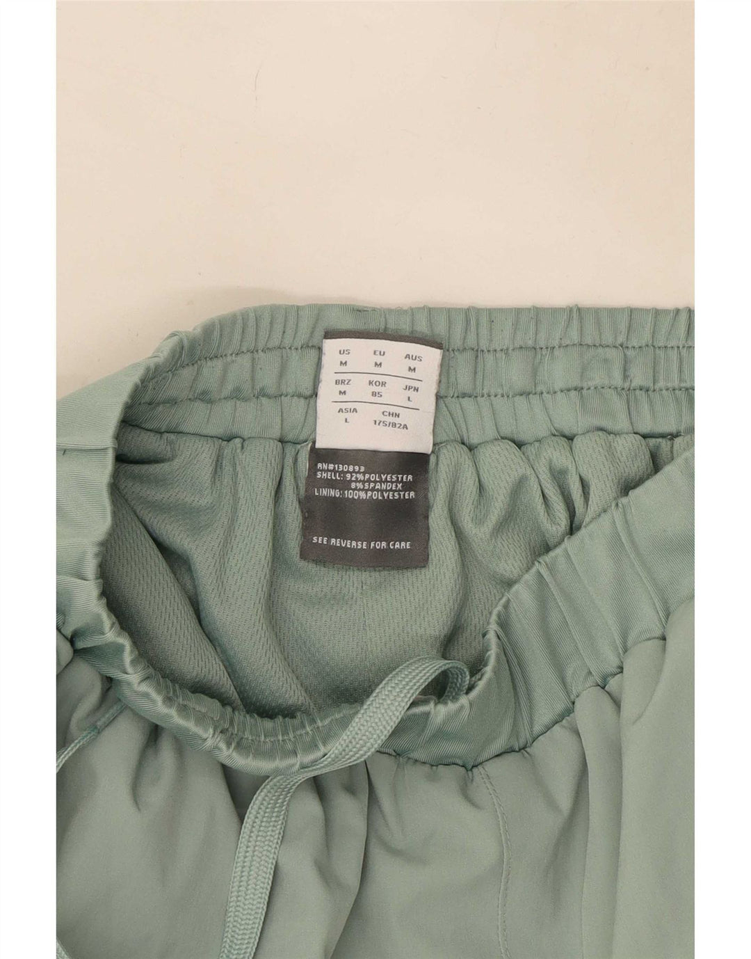 Pantalón New Balance Cargo Chándal Verde Medio Poliéster Hombre