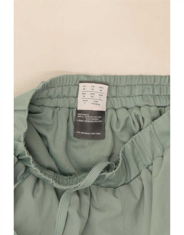 Pantalón New Balance Cargo Chándal Verde Medio Poliéster Hombre