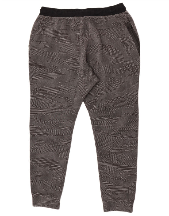 Nike - Pantalones de chándal para hombre, color gris, algodón