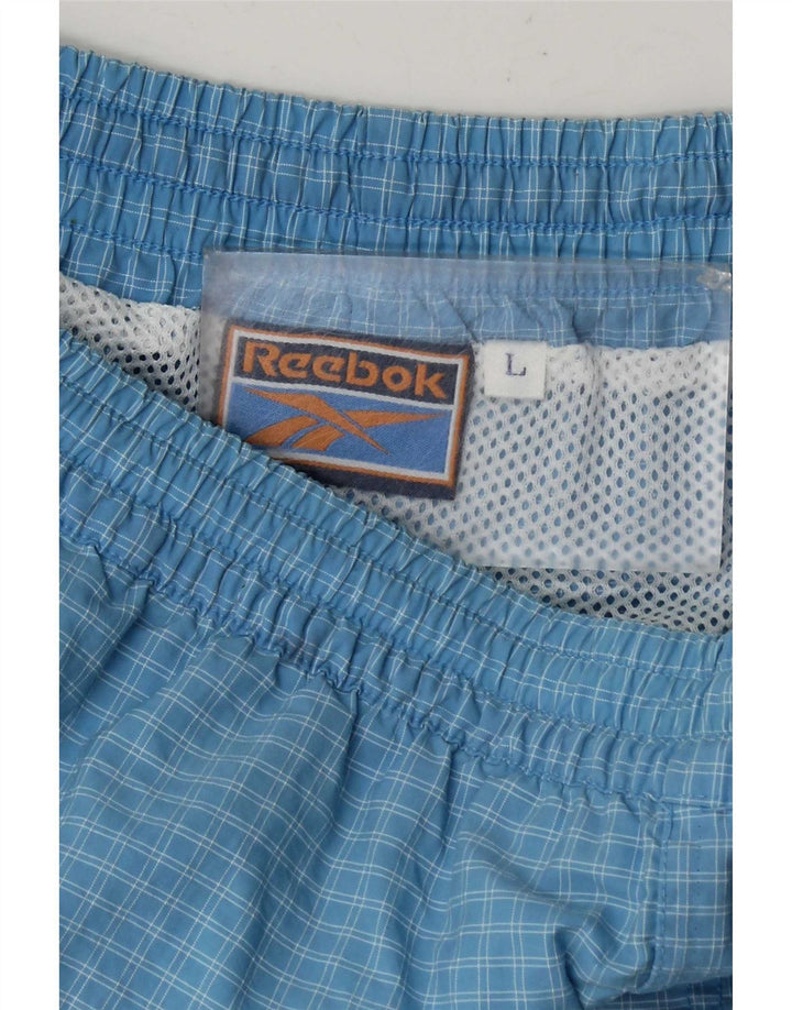 Pantalones cortos deportivos Reebok para hombre, cuadros azules grandes