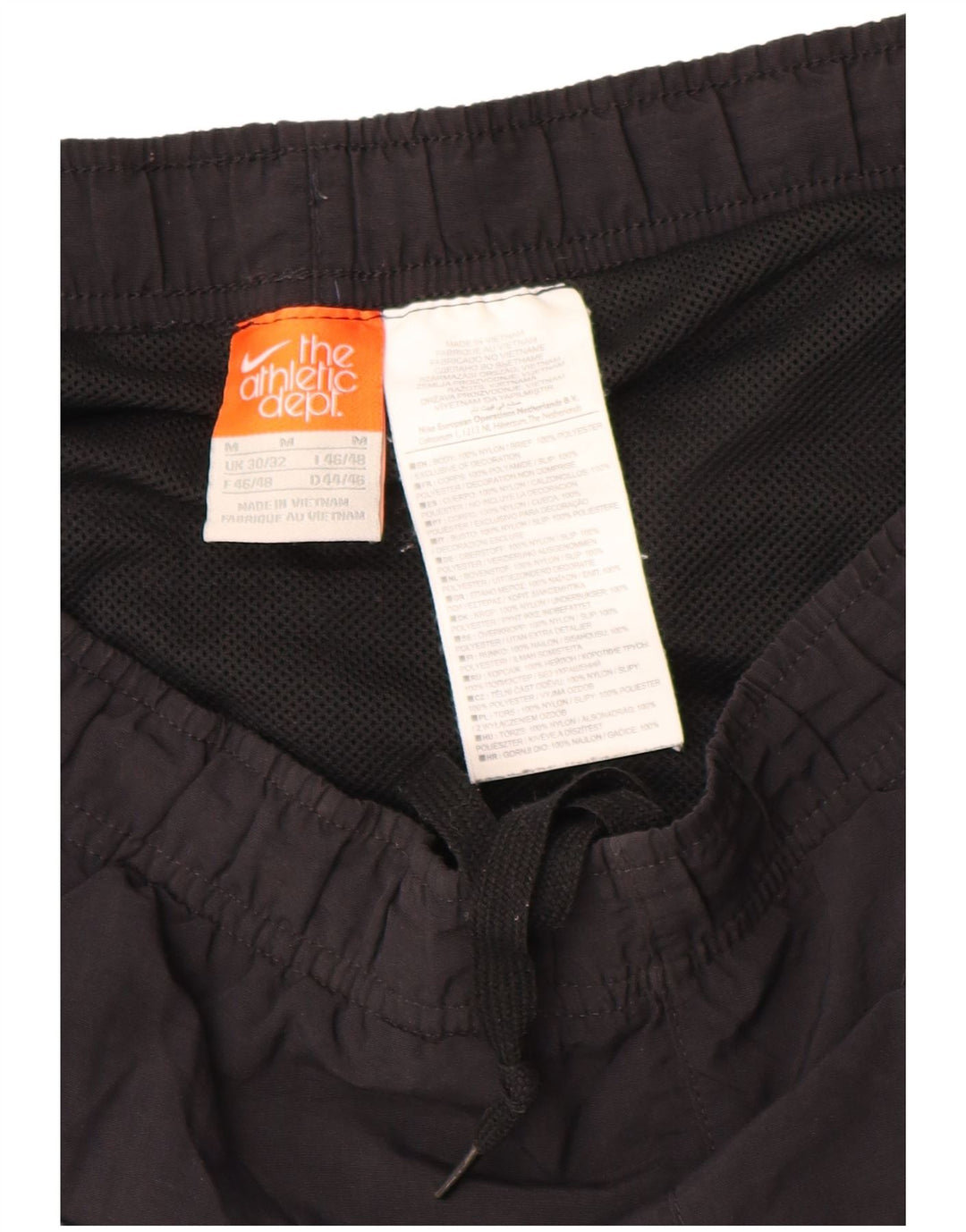 Pantalones cortos deportivos Nike de nailon color block en negro mediano para hombre