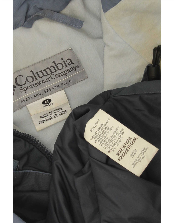 Columbia Chaqueta cortavientos con capucha para mujer UK 44 Azul medio Colorblock