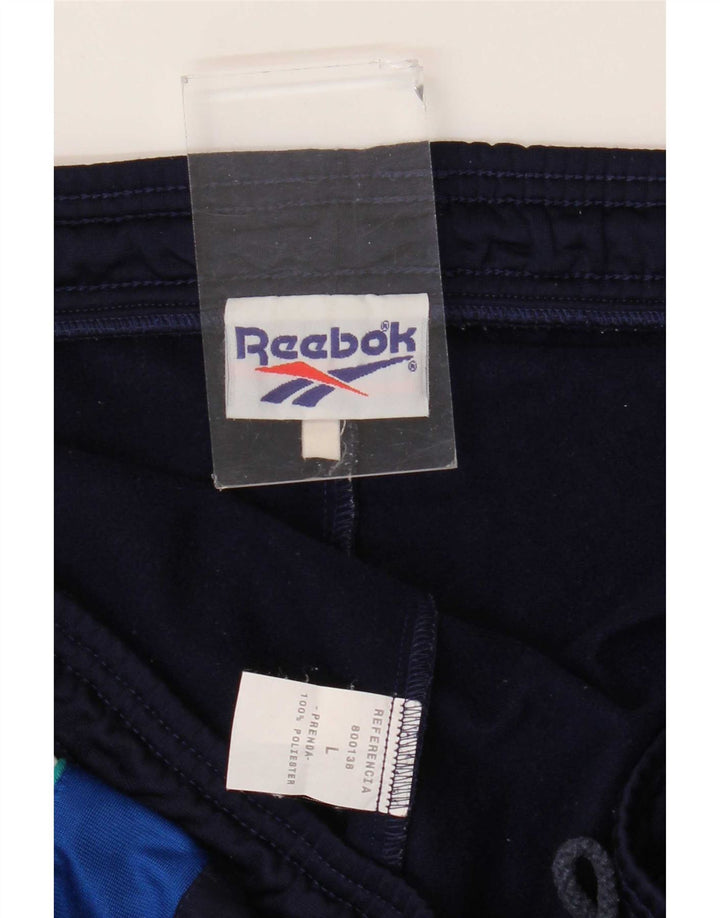Reebok - Pantalón de chándal para hombre, talla grande, color azul marino, poliéster