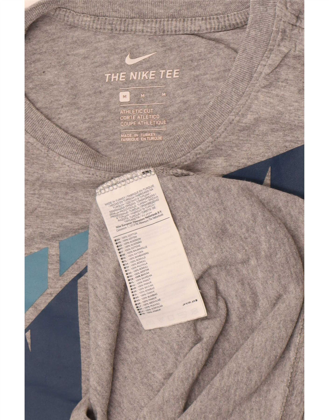 Nike Camiseta con gráfico de corte atlético para hombre Top de algodón gris medio