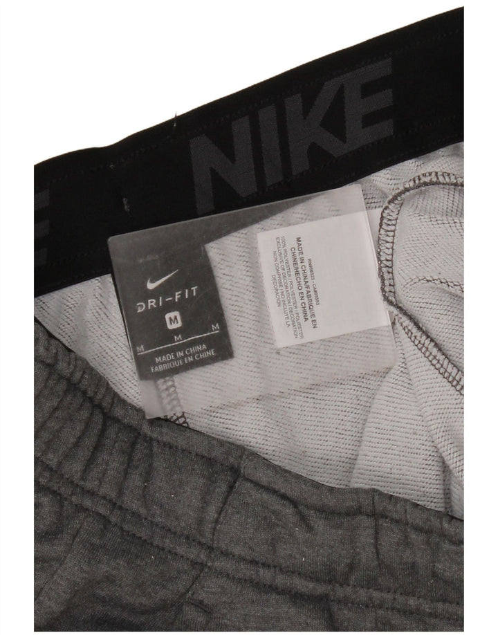Nike Dri Fit - Pantalones de chándal para mujer, talla 40, poliéster, color gris medio