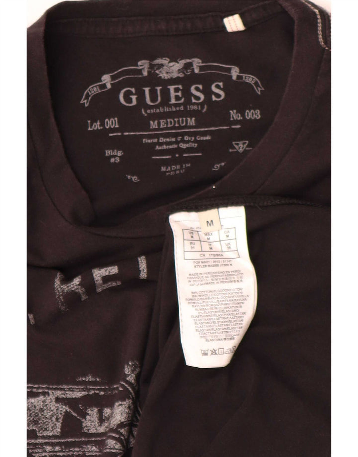 Guess Camiseta con gráfico regular para hombre Top mediano de algodón negro