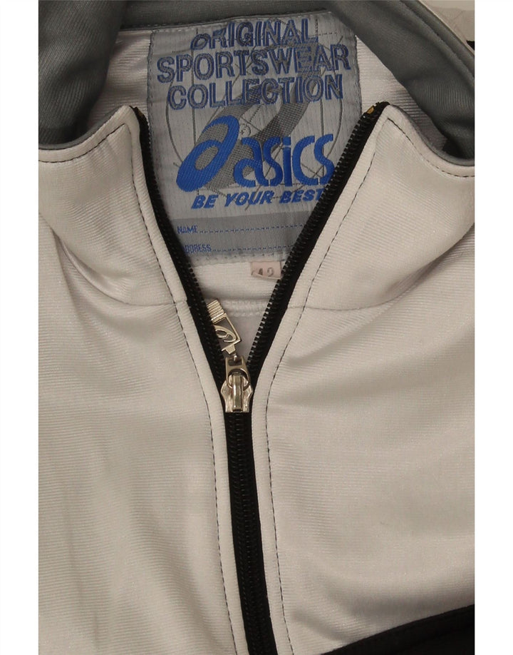 Chaqueta superior de chándal con gráfico Asics para mujer IT 42 Medium Black Colourblock